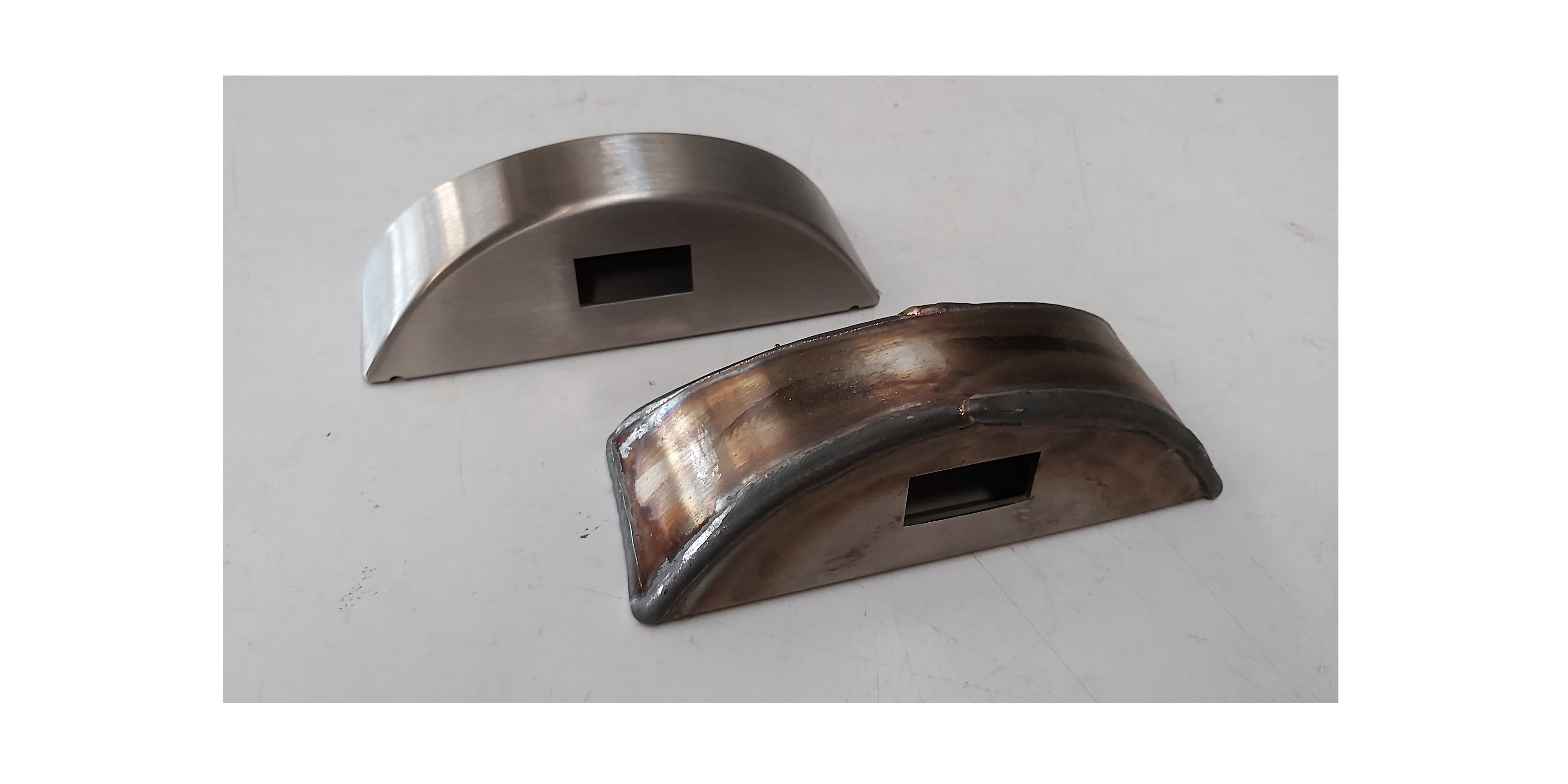 ROBOT CELL FOR THE WELD DRESSING AND SATIN FINISHING OF DIVERSE STAINLESS-STEEL PARTS ROBOT CELL FOR THE WELD DRESSING AND SATIN FINISHING OF DIVERSE STAINLESS-STEEL PARTS