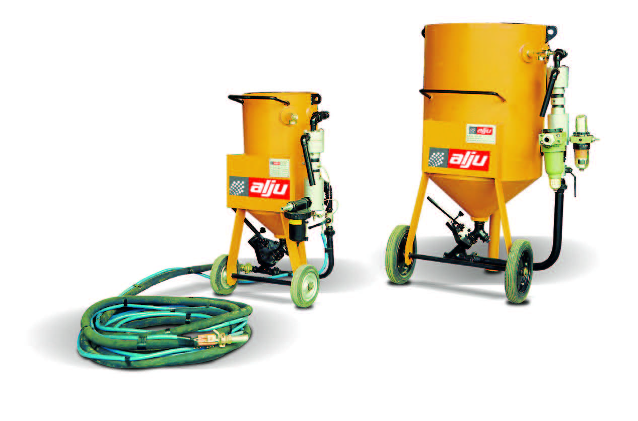ABRASIVE MATERIAL PROPELLING SYSTEMS